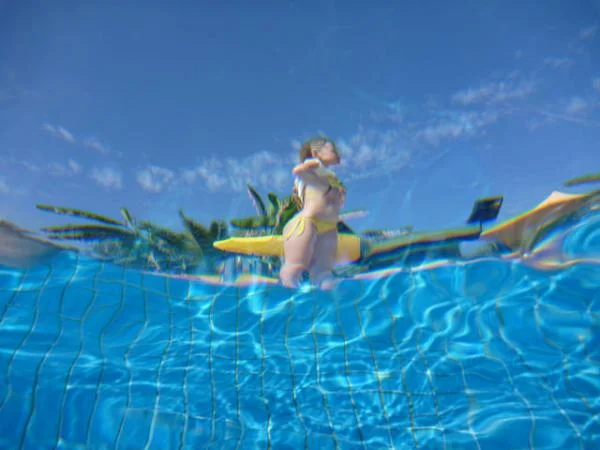 Из под воды