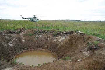 warhead-impact-crater-photo-novaya-gazeta1.jpg